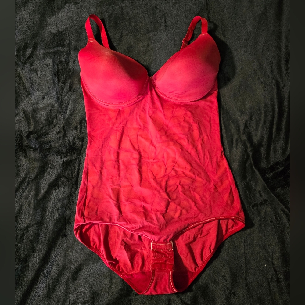Red shapewear body suit.